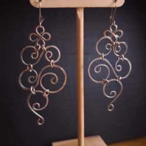 Eses filigrana (puede ser dorado o plteado)